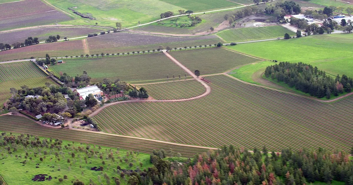 geographic area that is located outside towns and cities